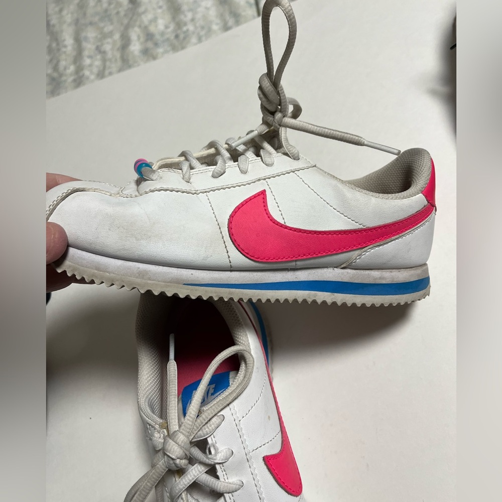 Nike White and Pinkโ Sneakers